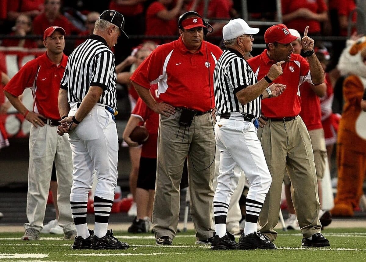 high school football, confrontation, football coach, referee, disagreement, argument, discussion, sports official, talking, argue, dispute, male, man, conflict, meeting, conversation, communication, quarrel, angry, team, relationship, coaches, football field, game, sport, body language, uncomfortable, standing, texas, stripes, striped, ruling, football coach, football coach, football coach, disagreement, argument, argue, body language, body language, body language, body language, body language
